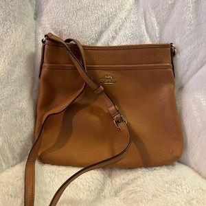 Brown coach side body bag height 9.5 in width 10.5 inch